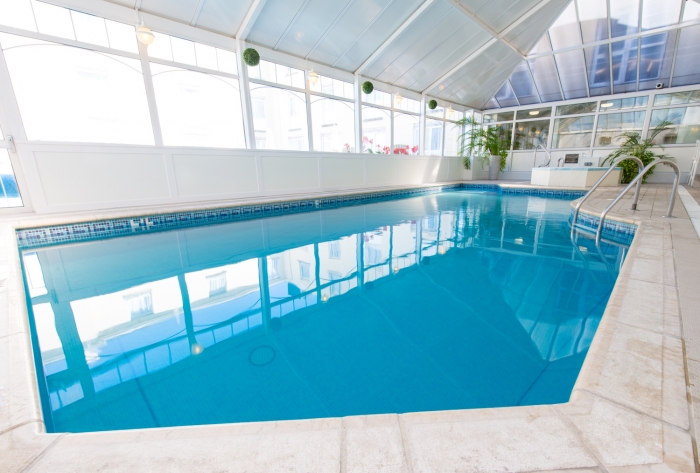 Relax by our luxury indoor pool