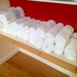Fresh towels provided for our guest only indoor pool at the Norfolk Lodge Hotel 